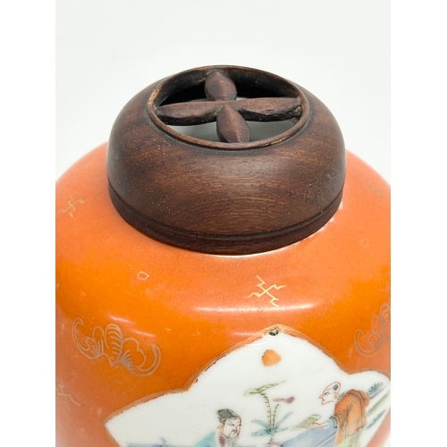 255 - A Late 19th/Early 20th Century Chinese coral ginger jar, with later wooden lid. 10x13cm