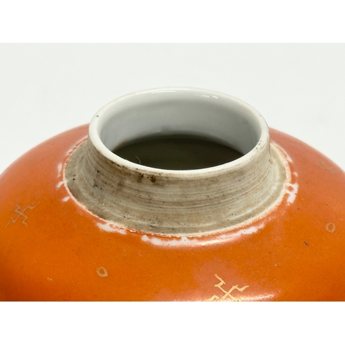 255 - A Late 19th/Early 20th Century Chinese coral ginger jar, with later wooden lid. 10x13cm