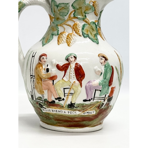 434 - A large 19th Century Staffordshire Pottery moulded relief jug. Willie Brewd A Peck O Maut. 20x18x24.... 