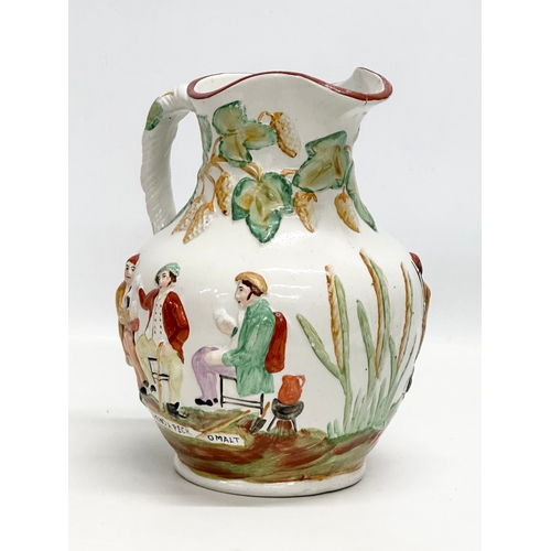 434 - A large 19th Century Staffordshire Pottery moulded relief jug. Willie Brewd A Peck O Maut. 20x18x24.... 