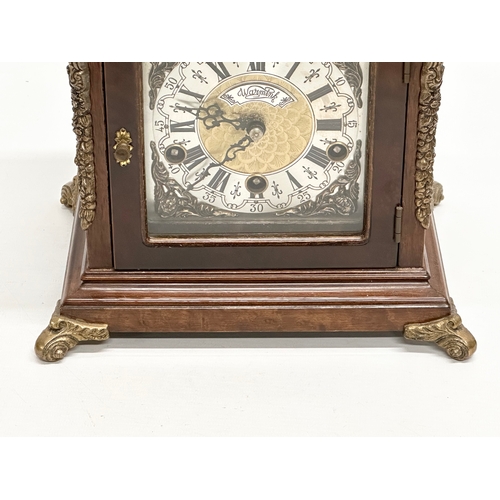 181 - Wuba Warmink. A vintage Dutch mantle clock with brass moon dial face and mounts. With key. 23x17x34c... 