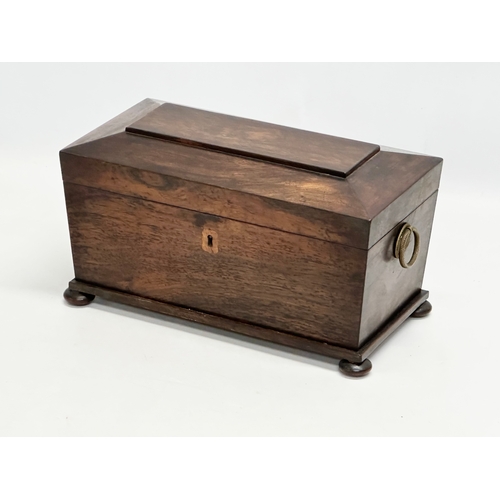 182 - An Early 19th Century Regency Period rosewood sarcophagus tea caddy. Circa 1810. 31x16x18cm