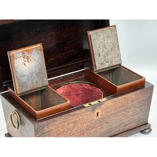 182 - An Early 19th Century Regency Period rosewood sarcophagus tea caddy. Circa 1810. 31x16x18cm