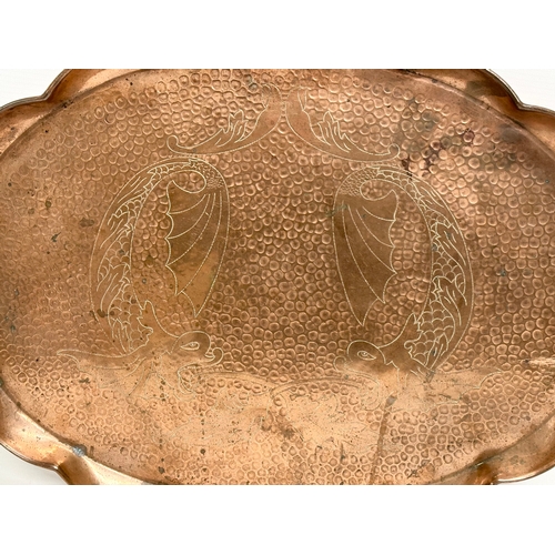 185 - J.F.Pool of Hayle. An Arts & Crafts copper tray with scalloped rim and impressed koi fish design. Ci... 