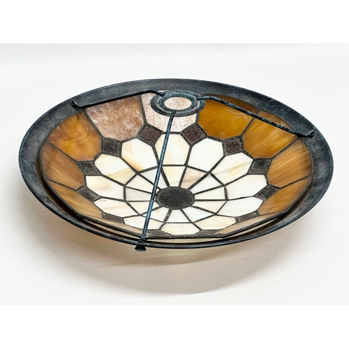 545 - A Tiffany style stained glass light shade. 35cm