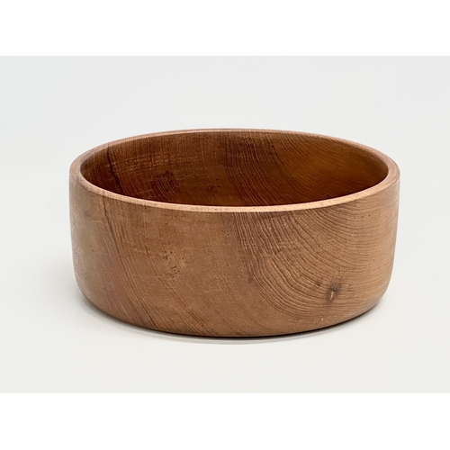 517 - A Mid Century teak fruit bowl. 25x10cm