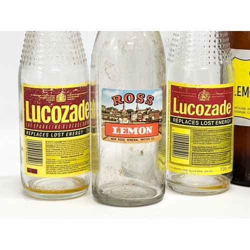 550 - A collection of vintage glass bottles. MacLennan’s Shan-Z-Ora Lemon Squash 32cm. Lyle & Kinahan Belf... 