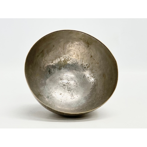 296 - A 19th Century Middle Eastern engraved brass and silver overlay bowl. 14x7cm