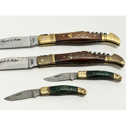 512 - 2 pairs of pocket knives. A pair of Laguiole pocket knives and a pair of miniature Damascus pocket k... 