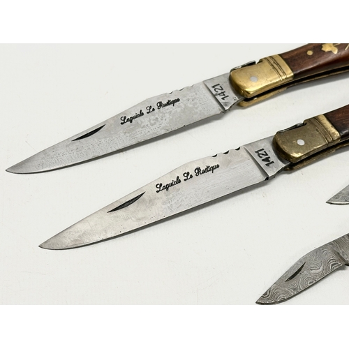 512 - 2 pairs of pocket knives. A pair of Laguiole pocket knives and a pair of miniature Damascus pocket k... 