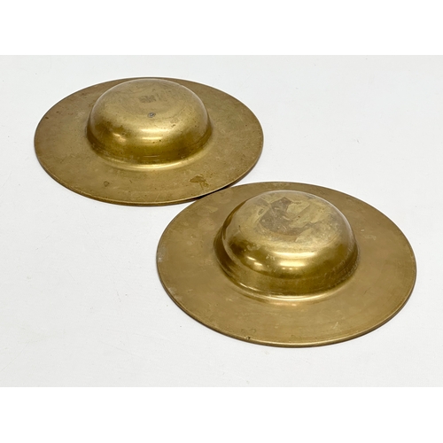 561 - A pair of Mid 20th Century Zodiac brass 12 sessions ashtray/bowls. 19x4cm