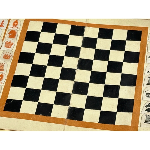 33 - Owen Jones. A De La Rue & Co’s Combined Pocket Chess and Draught Board With Chess and Draughts-Men. ... 