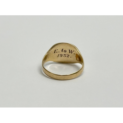 653 - A gents 9ct gold ring. 3.6 grams. Size N.   (11)