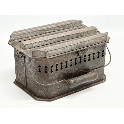 300 - A 19th Century French pierced tin foot warmer. 26x18x14cm