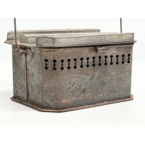 300 - A 19th Century French pierced tin foot warmer. 26x18x14cm