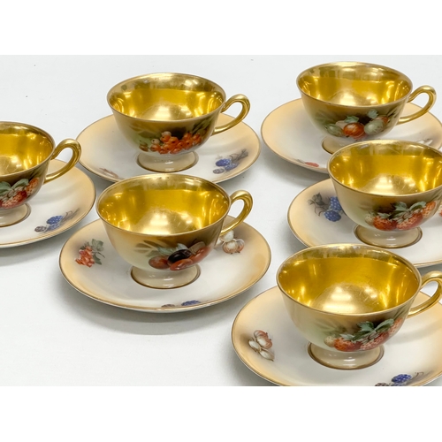 286 - A 15 piece Mid 20th Century gilt fruit pattern coffee service.