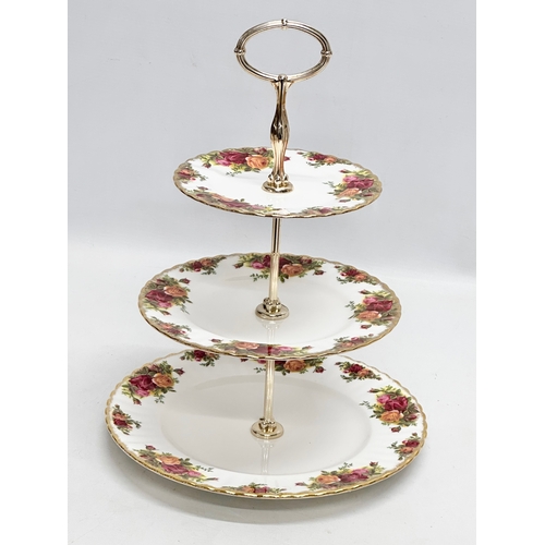 443 - A Royal Albert “Old Country Roses” 3 tier cake stand with box. 26x36cm