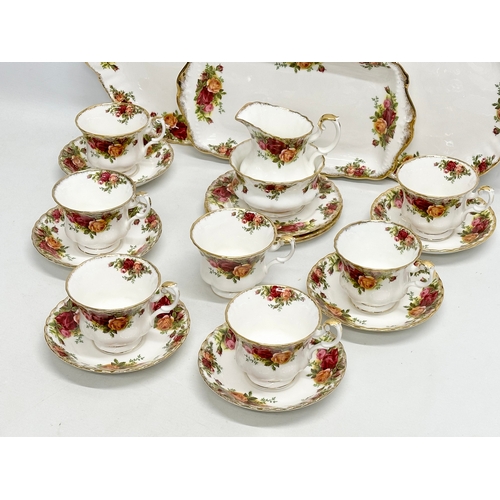 445 - A 21 piece Royal Albert “Old Country Roses” tea service. 2 cake plates, sandwich tray, 3 sandwich pl... 