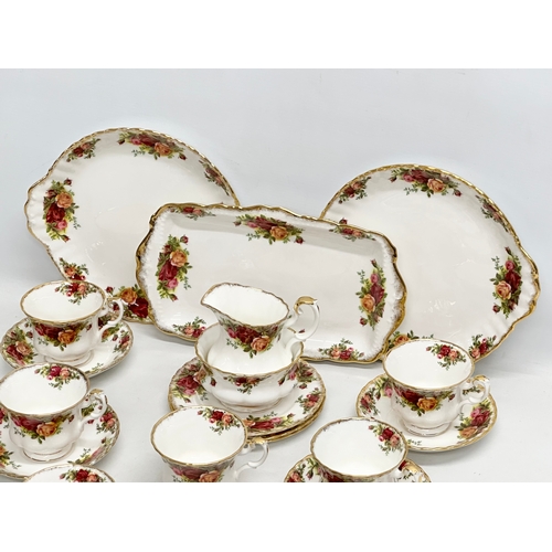 445 - A 21 piece Royal Albert “Old Country Roses” tea service. 2 cake plates, sandwich tray, 3 sandwich pl... 