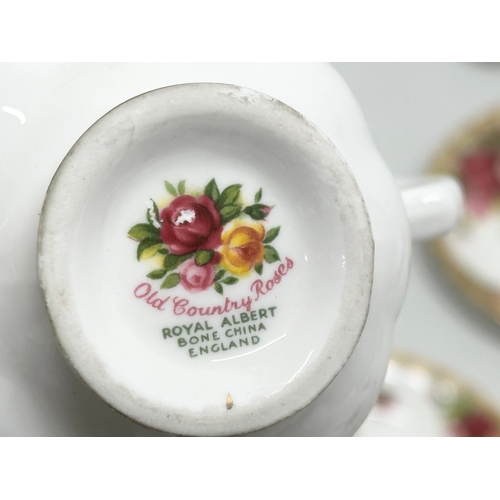 446 - A 14 piece Royal Albert “Old Country Roses” coffee service. 1962 saucers.