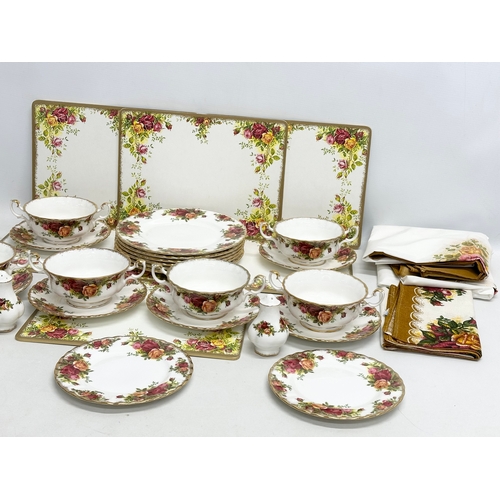 447 - A 31 piece Royal Albert “Old Country Roses” part dinner service. 6 soup bowls, 6 saucers, 3 sandwich... 