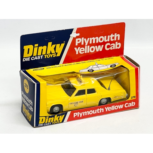 748 - 2 vintage Dinky cars. A Dinky Die Cast Toys Plymouth Yellow Cab. A Dinky Die Cast Toys Volvo 265 DL ... 