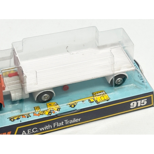 752 - A vintage unopened Dinky Toys A.E.C with Flat Trailer.