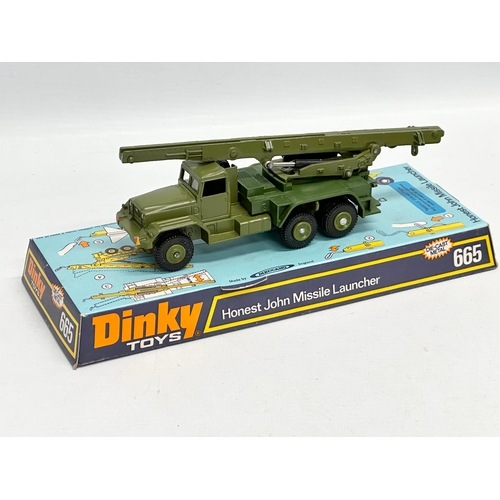 761 - 3 1970’s Dinky Toys. A 731 S.E.P.E.C.A.T Jaguar. A 665 Honest John Missile Launcher. An unopened 680... 