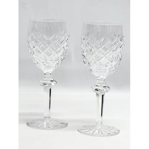 527 - Waterford Crystal. A pair of “Powerscourt” wine glasses 18cm. A pair of “Donegal” port glasses 10cm