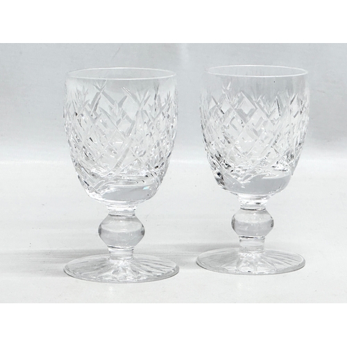 527 - Waterford Crystal. A pair of “Powerscourt” wine glasses 18cm. A pair of “Donegal” port glasses 10cm