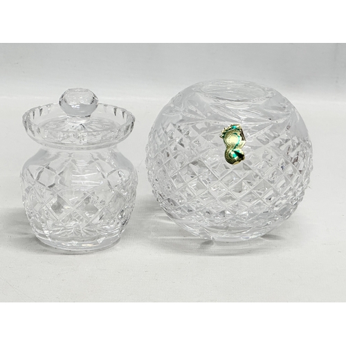 528 - Waterford Crystal. A small honey pot, 2 sets of milk jugs and sugar bowls, bulbous vase.