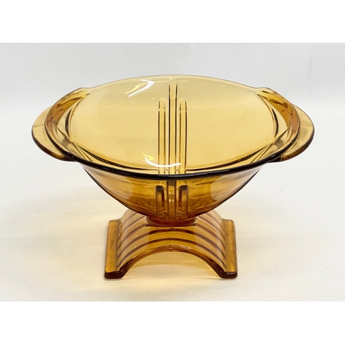 565 - A 1930’s Art Deco Czech amber glass bowl. By Stolzle. 25x21.5x13cm.