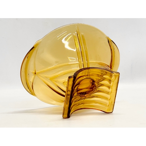 565 - A 1930’s Art Deco Czech amber glass bowl. By Stolzle. 25x21.5x13cm.