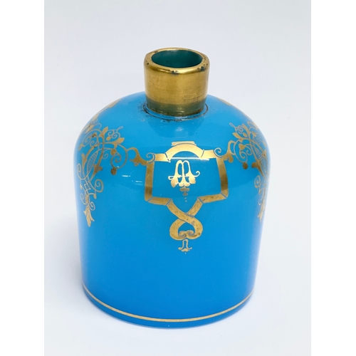 280 - A French gilt opaline glass scent bottle. Baccarat style. 7x9cm