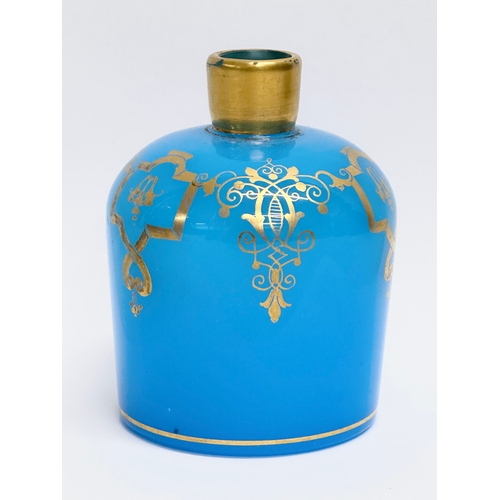 280 - A French gilt opaline glass scent bottle. Baccarat style. 7x9cm