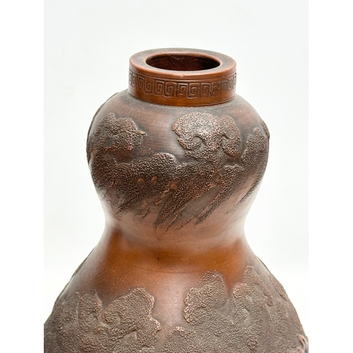 98 - A pair of Early 20th Century Chinese Yixing Zisha double gourd vases. 31cm