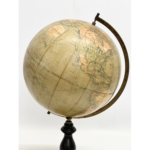 41 - An Early 20th Century Philips 9 inch Terrestrial Globe on ebonised base. George Philips & Son. 42cm.