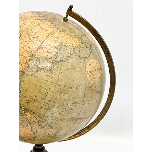 41 - An Early 20th Century Philips 9 inch Terrestrial Globe on ebonised base. George Philips & Son. 42cm.