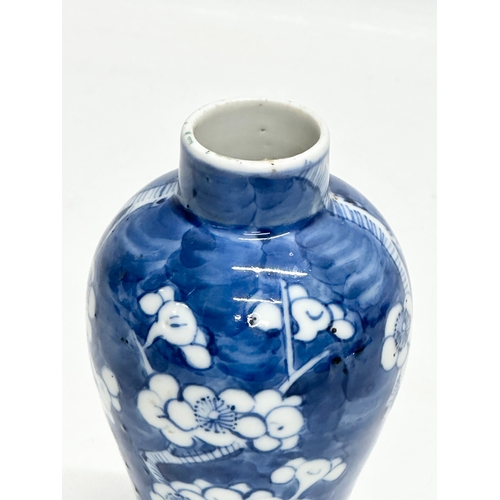 244 - A small 19th Century Chinese prunus pattern vase. Kangxi 4 character mark. 14cm