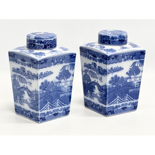 149 - A pair of Ringtons Limited Tea Merchants tea caddy’s. 12x22x20cm