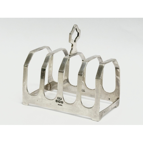 681 - A silver toast rack. Birmingham 1929. 49 grams.    (9)