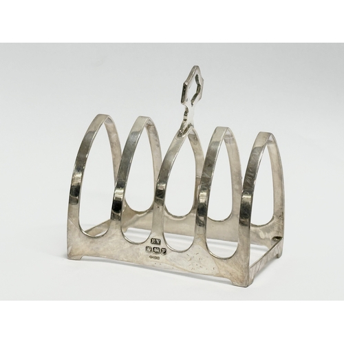 682 - A silver toast rack. Sheffield 1946. 51 grams.    (9)