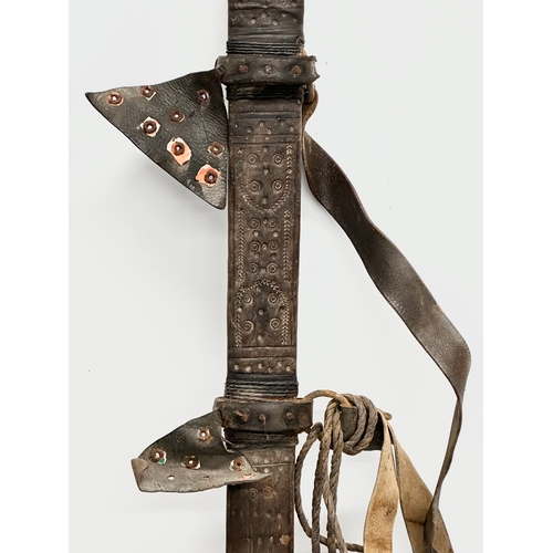 275 - A Late 19th Century Sudanese Mahdi Dervish Kaskara Broadsword, with Scabbard. 112cm