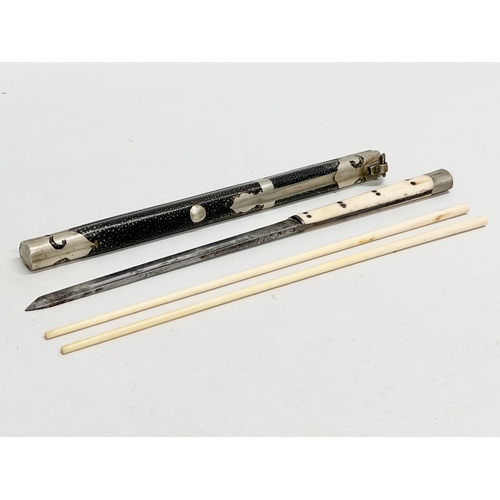 14 - A Late 19th Century Japanese bone travelling cutlery set, with knife.  (5)