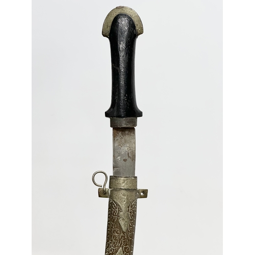 279 - A Late 19th Century Moroccan dagger. 39cm