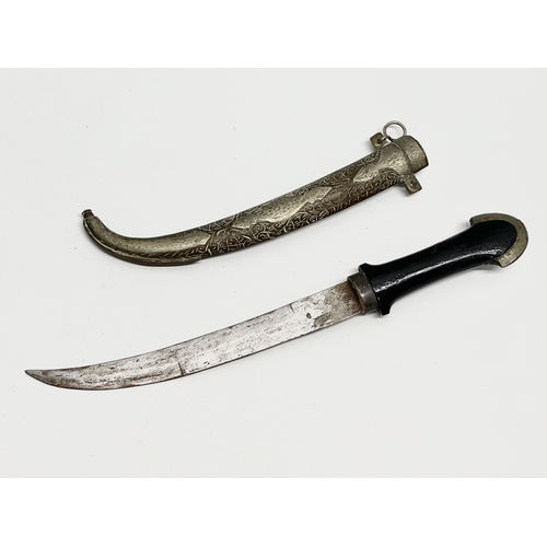 279 - A Late 19th Century Moroccan dagger. 39cm