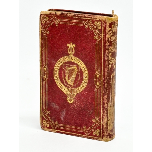 411 - A miniature 19th Century Century book on The Irish Melodies by Thomas Moore. 6x9cm (2)