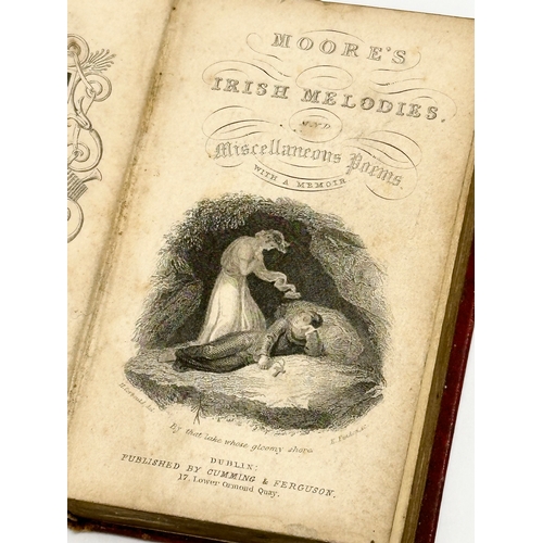 411 - A miniature 19th Century Century book on The Irish Melodies by Thomas Moore. 6x9cm (2)