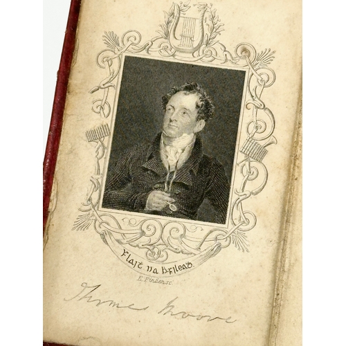 411 - A miniature 19th Century Century book on The Irish Melodies by Thomas Moore. 6x9cm (2)