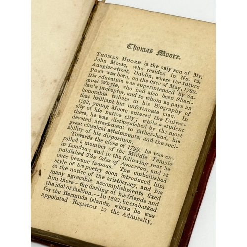 411 - A miniature 19th Century Century book on The Irish Melodies by Thomas Moore. 6x9cm (2)